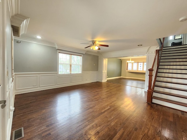 5115 E Ln, Mchenry, IL 60050 - empty room with ornamental molding, a ceiling fan, healthy amount of natural light, stairs, and wainscoting