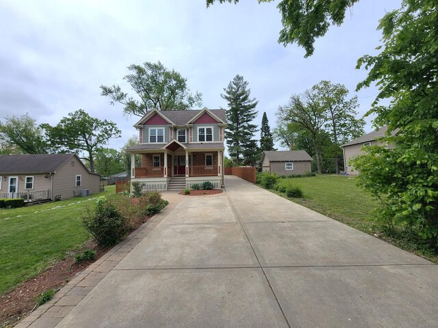 5115 E Ln, Mchenry, IL 60050 - craftsman house featuring a porch, driveway, a front lawn, and central air condition unit