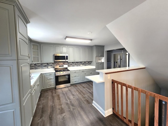 5115 E Ln, Mchenry, IL 60050 - kitchen with appliances with stainless steel finishes, gray cabinetry, light countertops, and dark wood-style flooring