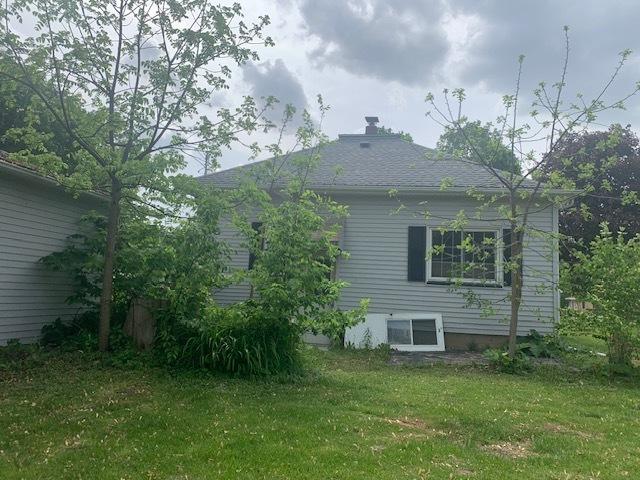122 Portland Ave, Oglesby, IL 61348 - view of property exterior featuring a yard