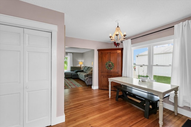 55 N 2600e Rd, Rankin, IL 60960 - dining room with a chandelier, light wood-style floors, and baseboards