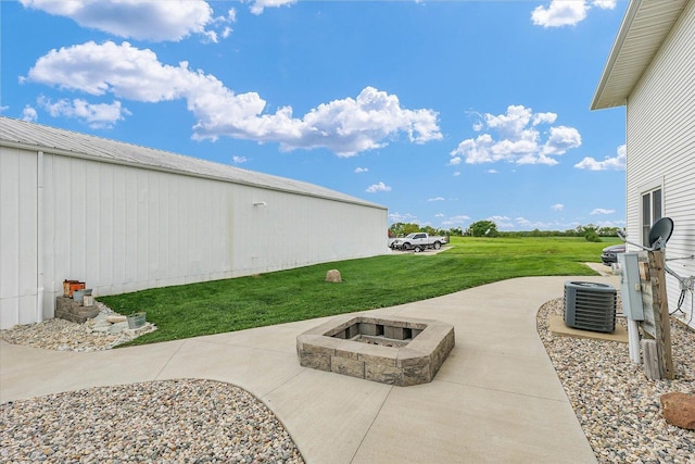 55 N 2600e Rd, Rankin, IL 60960 - view of patio / terrace featuring a fire pit and cooling unit