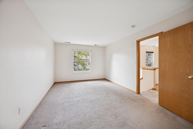 18582 W Point Dr, Tinley Park, IL 60477 - spare room featuring carpet flooring and baseboards