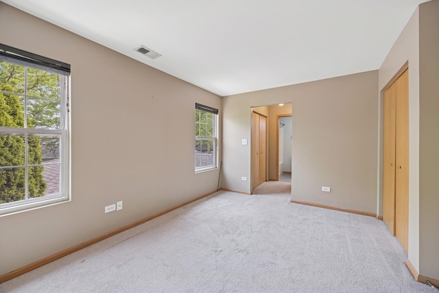 18582 W Point Dr, Tinley Park, IL 60477 - empty room featuring baseboards and light carpet