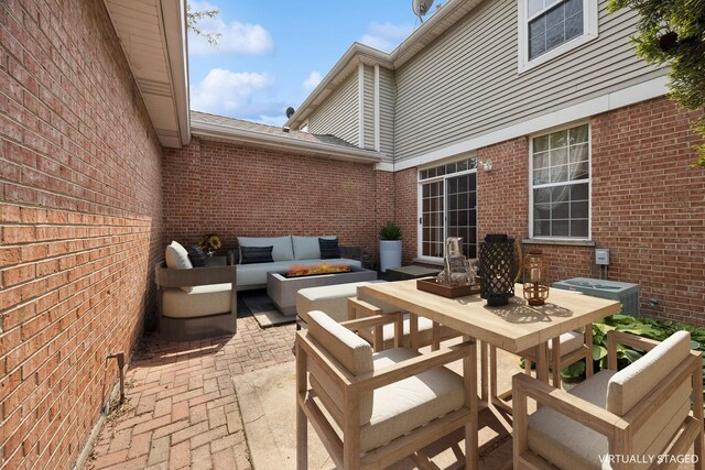 18582 W Point Dr, Tinley Park, IL 60477 - view of patio featuring an outdoor living space with a fire pit, outdoor dining area, and central AC