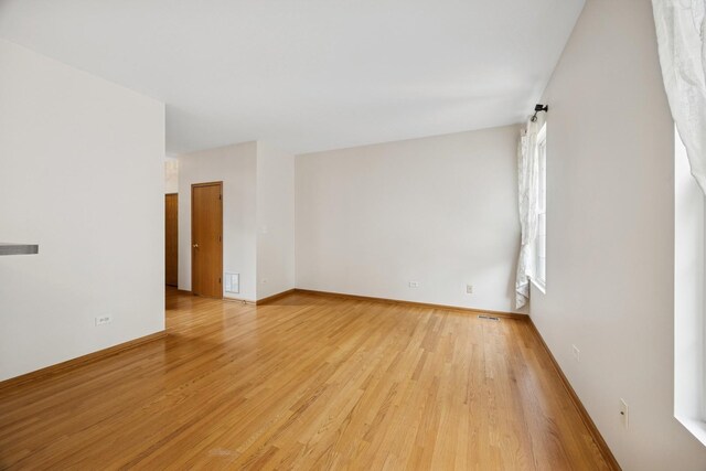 18582 W Point Dr, Tinley Park, IL 60477 - unfurnished room with light wood-style floors and baseboards