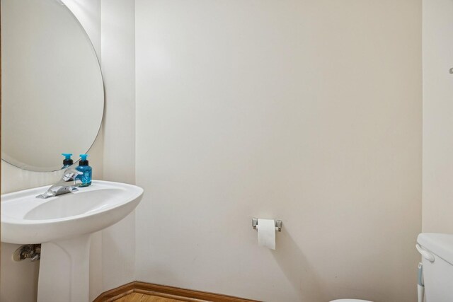 18582 W Point Dr, Tinley Park, IL 60477 - half bath featuring toilet and a sink