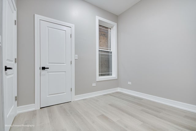 3926 W Arthington St, Chicago, IL 60624 - spare room featuring light wood-style floors and baseboards