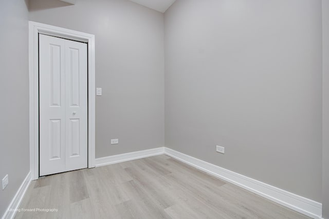 3926 W Arthington St, Chicago, IL 60624 - empty room featuring light wood finished floors and baseboards