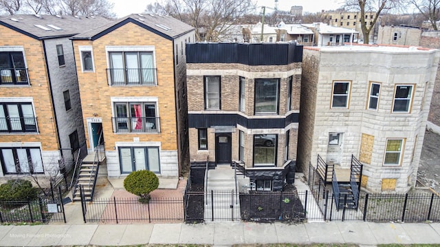 3926 W Arthington St, Chicago, IL 60624 - view of property featuring brick siding and stone siding
