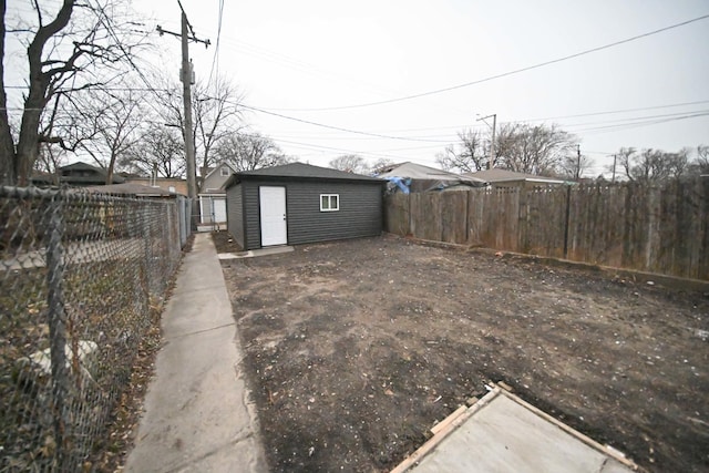 7832 S Evans Ave, Chicago, IL 60619 - view of yard featuring an outbuilding