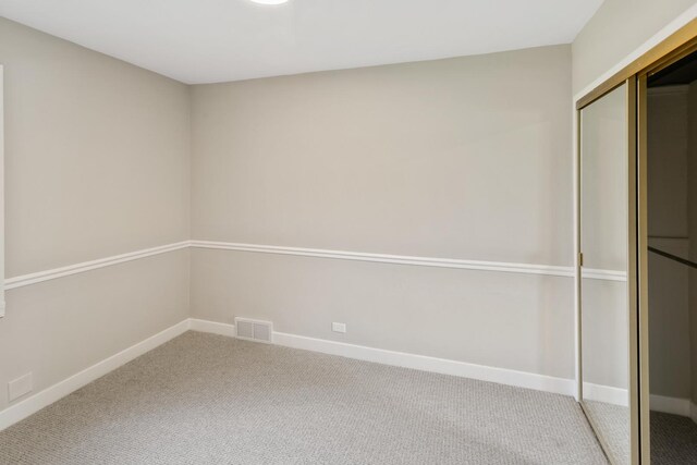 3413 N Schultz Dr, Lansing, IL 60438 - unfurnished bedroom with carpet floors, a closet, and baseboards