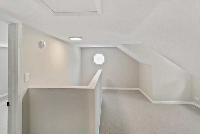 3413 N Schultz Dr, Lansing, IL 60438 - additional living space featuring carpet flooring, baseboards, and lofted ceiling