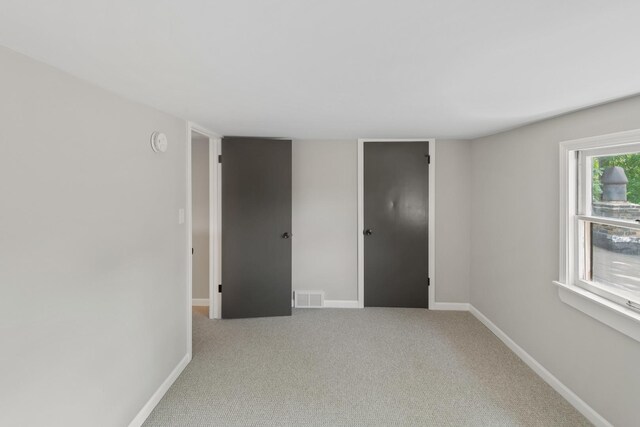 3413 N Schultz Dr, Lansing, IL 60438 - carpeted empty room featuring baseboards and a smoke detector