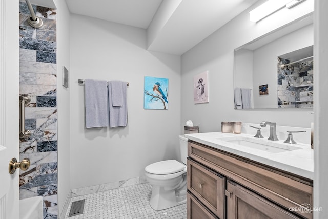 1900 Millburne Rd, Lake Forest, IL 60045 - bathroom featuring vanity, toilet, a shower, and tile patterned floors