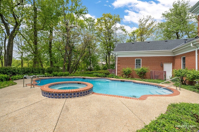 1900 Millburne Rd, Lake Forest, IL 60045 - view of swimming pool with a patio area and a pool with connected hot tub