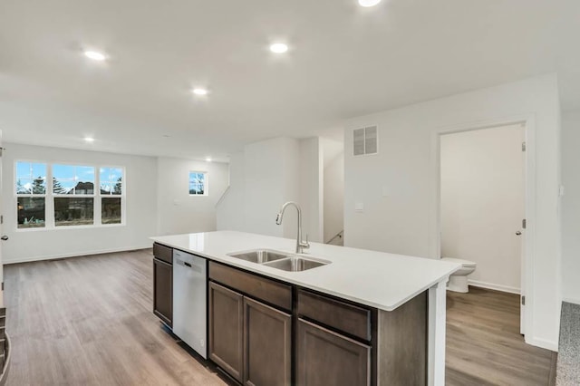 358 Bridgeview Ct, Saint Charles, IL 60174 - kitchen with a sink, dishwasher, light countertops, light wood-type flooring, and recessed lighting