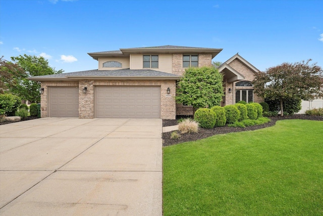 19325 Kickapoo Dr, Tinley Park, IL 60487 - view of front of property featuring concrete driveway, a front lawn, and brick siding