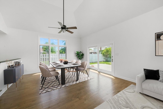 19325 Kickapoo Dr, Tinley Park, IL 60487 - dining area with a ceiling fan, wood finished floors, high vaulted ceiling, and baseboards