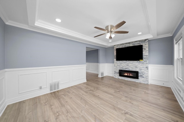 9632 S Yale Ave, Chicago, IL 60628 - unfurnished living room with ceiling fan, a raised ceiling, ornamental molding, wainscoting, and recessed lighting