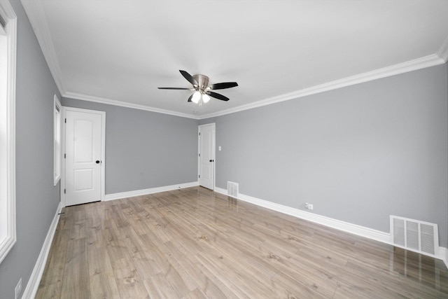 9632 S Yale Ave, Chicago, IL 60628 - unfurnished room featuring ceiling fan, light wood-type flooring, crown molding, and baseboards