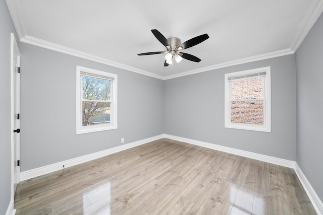 9632 S Yale Ave, Chicago, IL 60628 - unfurnished room featuring light wood finished floors, baseboards, a ceiling fan, and crown molding