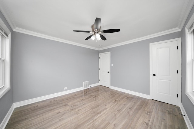 9632 S Yale Ave, Chicago, IL 60628 - empty room with wood finished floors, baseboards, a ceiling fan, and ornamental molding