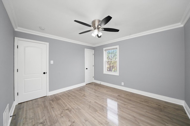 9632 S Yale Ave, Chicago, IL 60628 - empty room with wood finished floors, ornamental molding, baseboards, a ceiling fan, and a smoke detector
