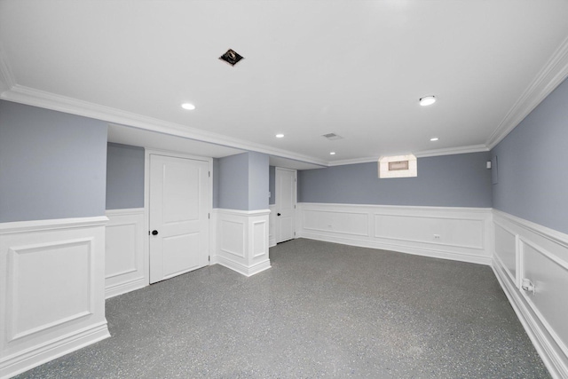 9632 S Yale Ave, Chicago, IL 60628 - finished basement featuring a wainscoted wall, ornamental molding, recessed lighting, and a decorative wall