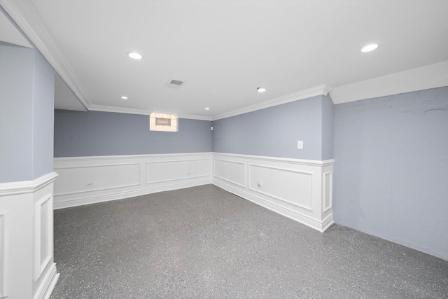 9632 S Yale Ave, Chicago, IL 60628 - unfurnished room with a wainscoted wall, crown molding, recessed lighting, a decorative wall, and speckle patterned floor