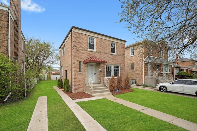 9632 S Yale Ave, Chicago, IL 60628 - view of front of house with brick siding and a front lawn