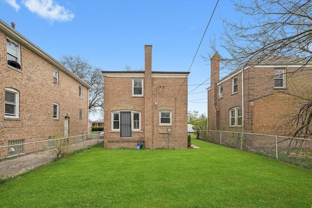 9632 S Yale Ave, Chicago, IL 60628 - back of property with brick siding and a chimney