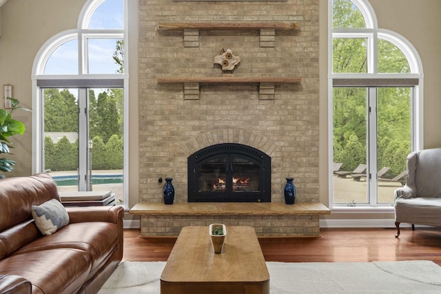 8600 Beall St, Dyer, IN 46311 - living room with wood finished floors and a brick fireplace