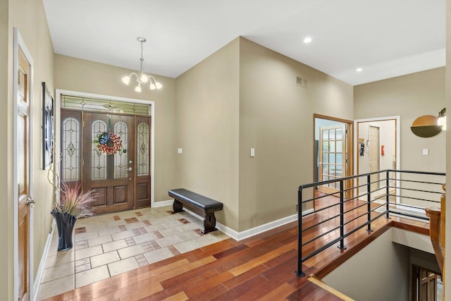 8600 Beall St, Dyer, IN 46311 - foyer entrance featuring a chandelier, baseboards, recessed lighting, and wood finished floors