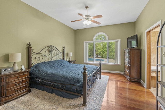 8600 Beall St, Dyer, IN 46311 - bedroom with wood finished floors, baseboards, and a ceiling fan