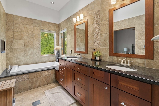 8600 Beall St, Dyer, IN 46311 - full bath featuring tile walls, double vanity, and a garden tub