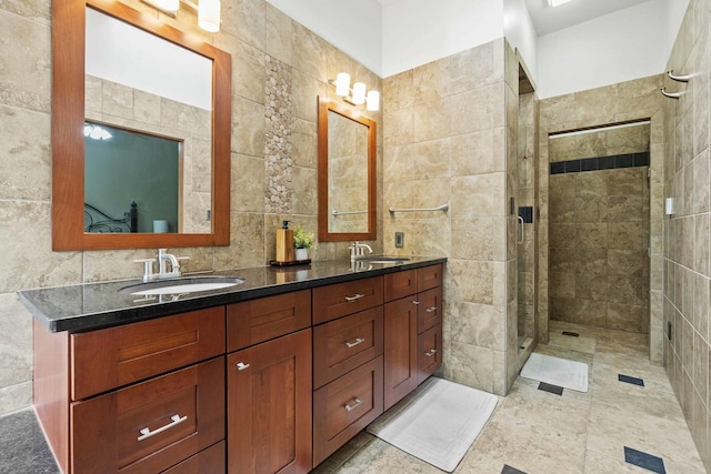 8600 Beall St, Dyer, IN 46311 - full bathroom with tile walls, a stall shower, and double vanity
