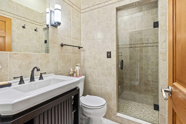 8600 Beall St, Dyer, IN 46311 - full bathroom featuring tile walls, toilet, a shower stall, and vanity