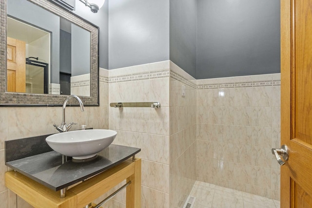8600 Beall St, Dyer, IN 46311 - full bath with tile walls, vanity, a tile shower, and wainscoting