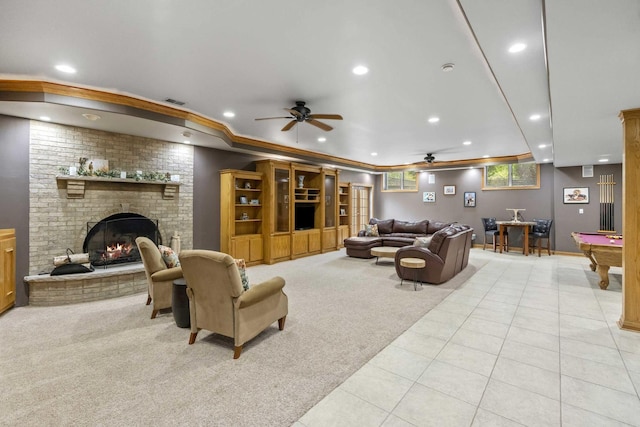 8600 Beall St, Dyer, IN 46311 - carpeted living room featuring tile patterned floors, a ceiling fan, recessed lighting, a brick fireplace, and billiards
