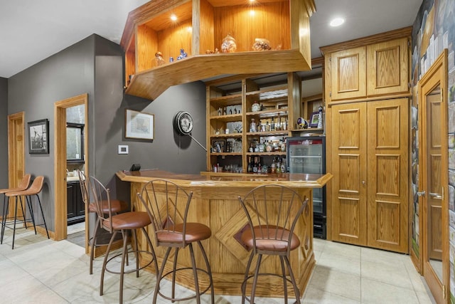 8600 Beall St, Dyer, IN 46311 - indoor dry bar with light tile patterned floors and recessed lighting
