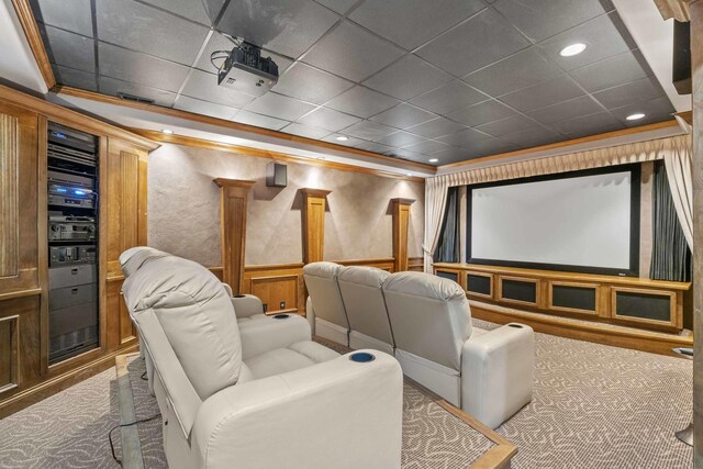 8600 Beall St, Dyer, IN 46311 - carpeted cinema room with ornamental molding, a wainscoted wall, and a paneled ceiling