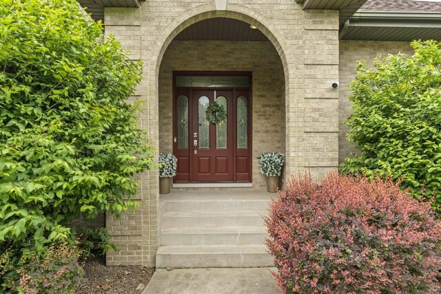 8600 Beall St, Dyer, IN 46311 - property entrance featuring brick siding