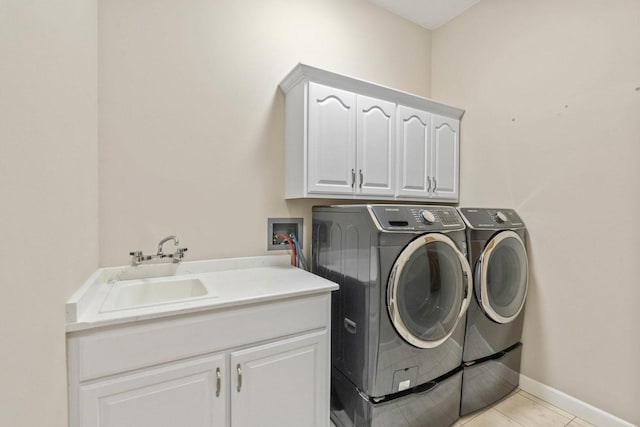 8600 Beall St, Dyer, IN 46311 - laundry area with cabinet space, separate washer and dryer, and baseboards