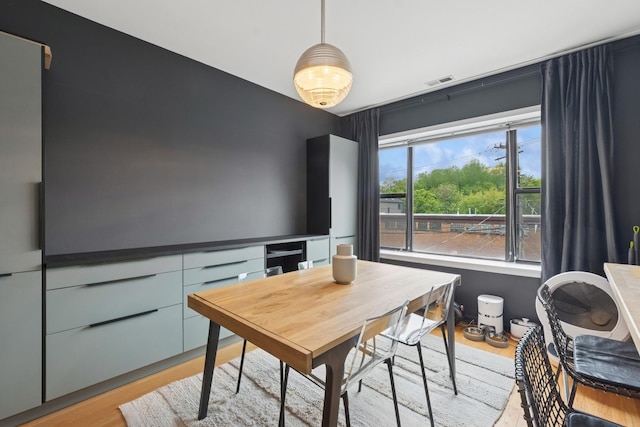 5730 N Hermitage Ave Unit 2, Chicago, IL 60660 - dining area with light wood-type flooring