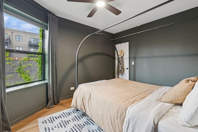 5730 N Hermitage Ave Unit 2, Chicago, IL 60660 - bedroom with wood finished floors and a ceiling fan