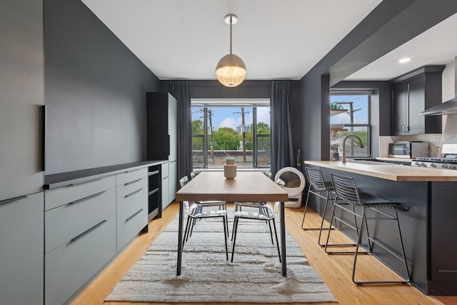 5730 N Hermitage Ave Unit 2, Chicago, IL 60660 - dining space with light wood-style floors