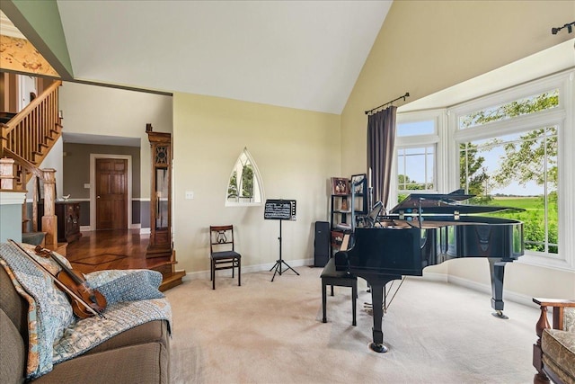 27425 S Steven Ray Dr, Monee, IL 60449 - sitting room featuring stairway, plenty of natural light, carpet flooring, and high vaulted ceiling