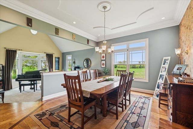 27425 S Steven Ray Dr, Monee, IL 60449 - dining space featuring a chandelier, light wood finished floors, and ornamental molding