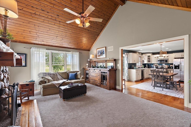 27425 S Steven Ray Dr, Monee, IL 60449 - living room featuring wood ceiling, high vaulted ceiling, a ceiling fan, light colored carpet, and a fireplace